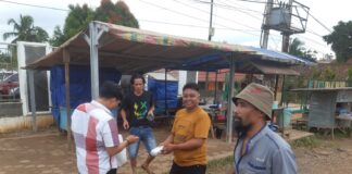 Berkah Bulan Ramadhan IMBA Bagikan Nasi ke Tukang Ojek untuk Berbuka Puasa